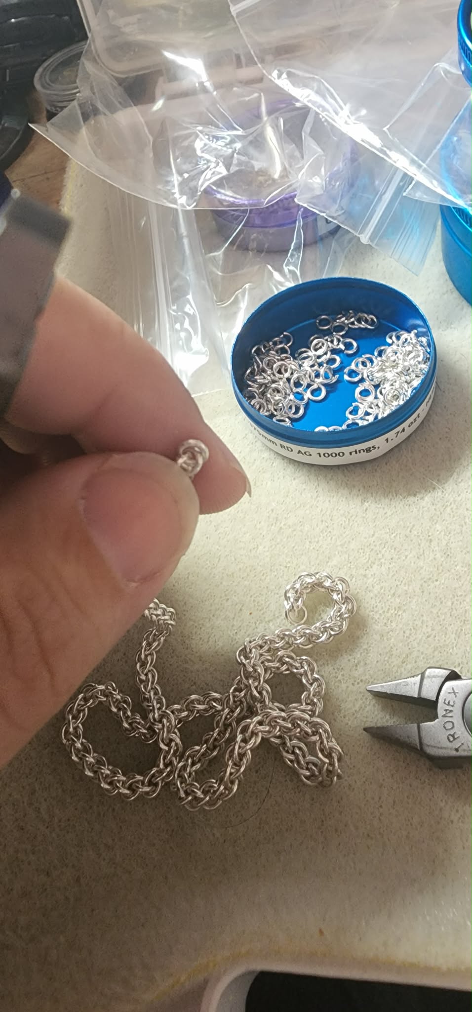 Dawn working on chainmaille